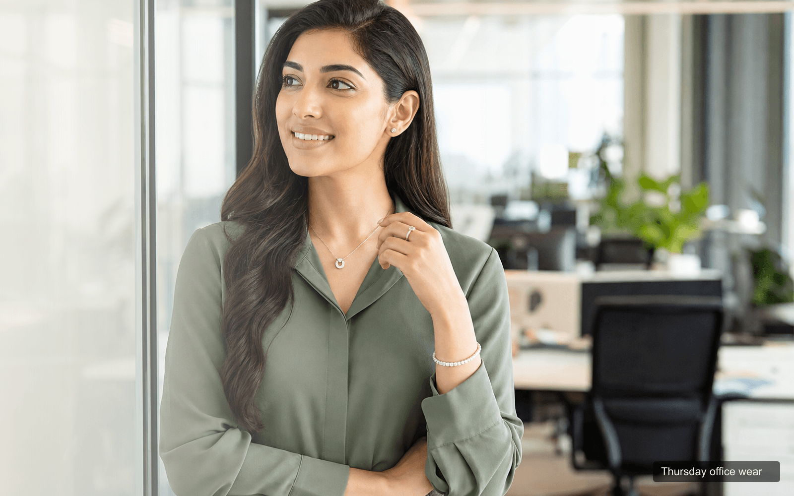 Woman wearing minimal diamond jewellery